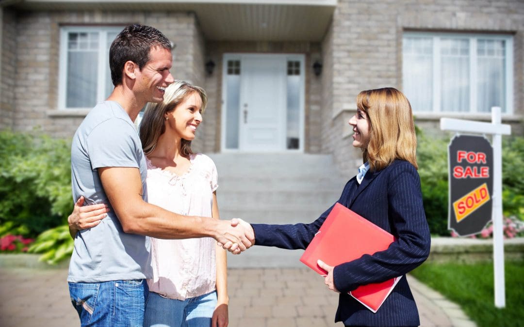 richmond hill realtor shaking hands with clients